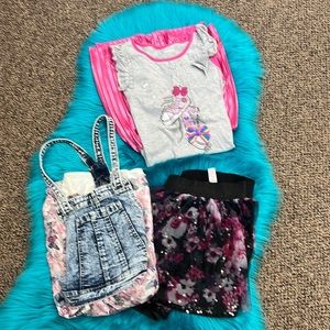 2 girls dresses size 14//16 and one skirt size 16.